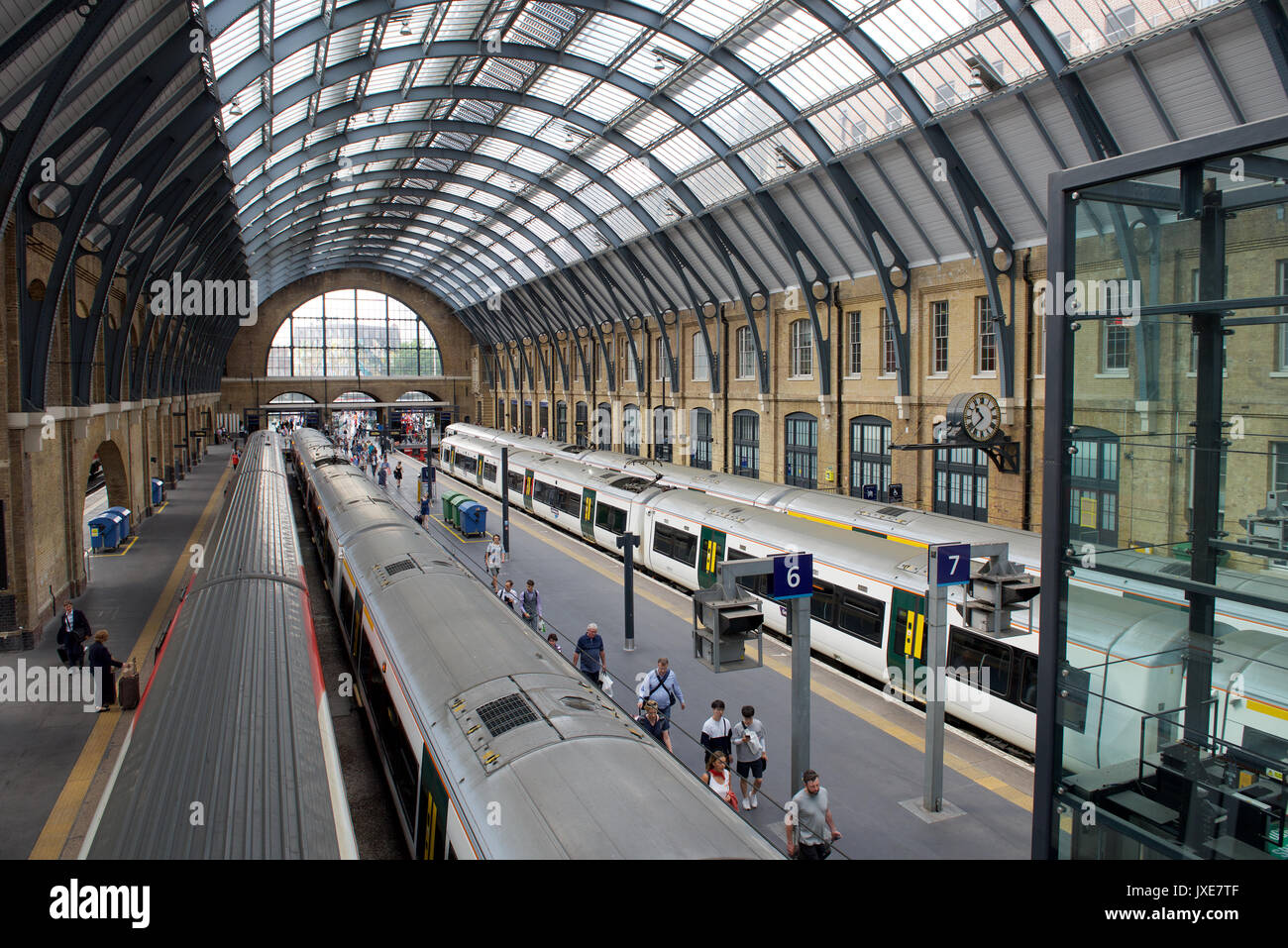 Passengers getting off a train at London Kings Cross railway station
