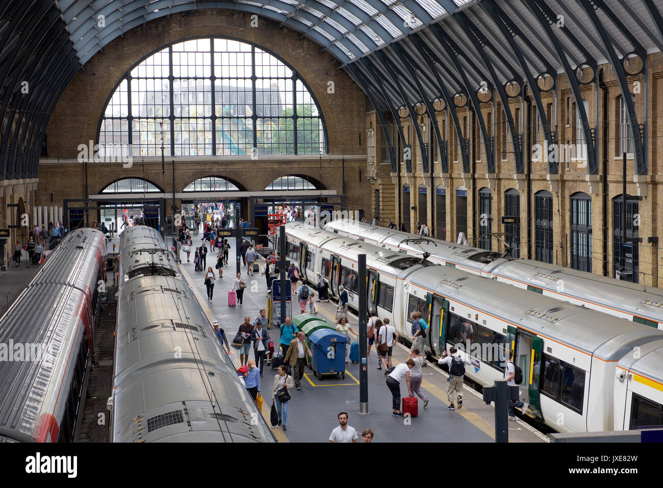 Passengers getting off a train at London Kings Cross railway station
