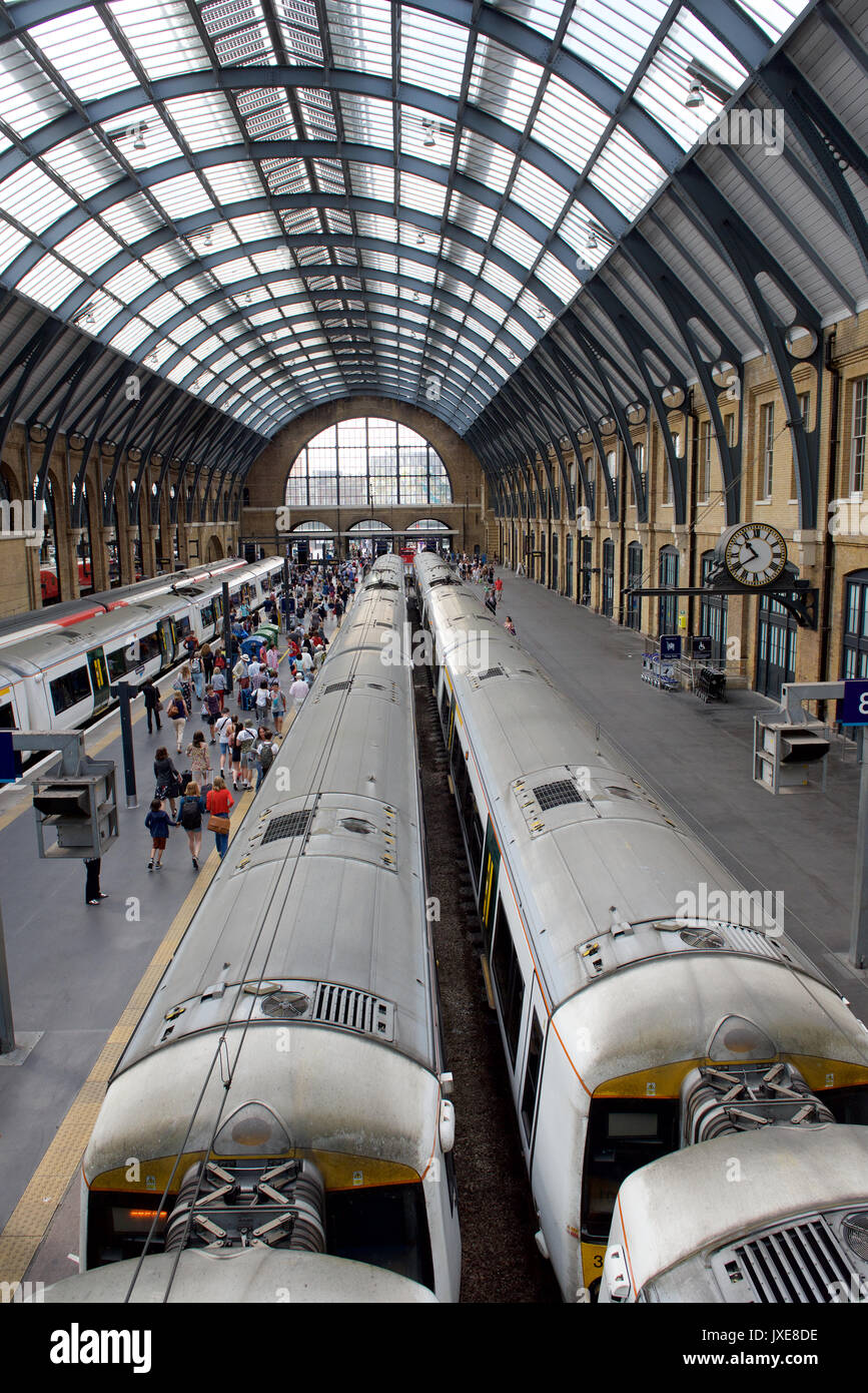 Passengers getting off a train at London Kings Cross railway station