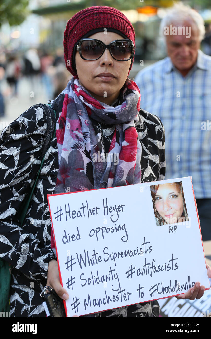 Manchester, UK. 15th Aug, 2017. A Muslim women stood with a placard which reads 'Heather Heyer died opposing white supremacists', St Peters Square, Manchester, 15th August, 2017 Credit: Barbara Cook/Alamy Live News Stock Photo