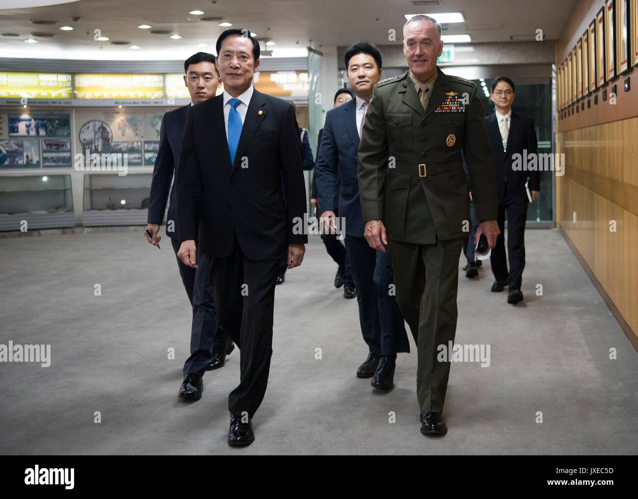 U.S. Chairman of the Joint Chiefs Gen. Joseph Dunford, right, walks with South Korean Minister of Defense Song Young-moo at the Ministry of Defense August 14, 2017 in Yongsan, South Korea. Dunford is meeting military leaders in the Asia-Pacific region as tensions rise with North Korea over nuclear and ballistic missiles tests. Stock Photo