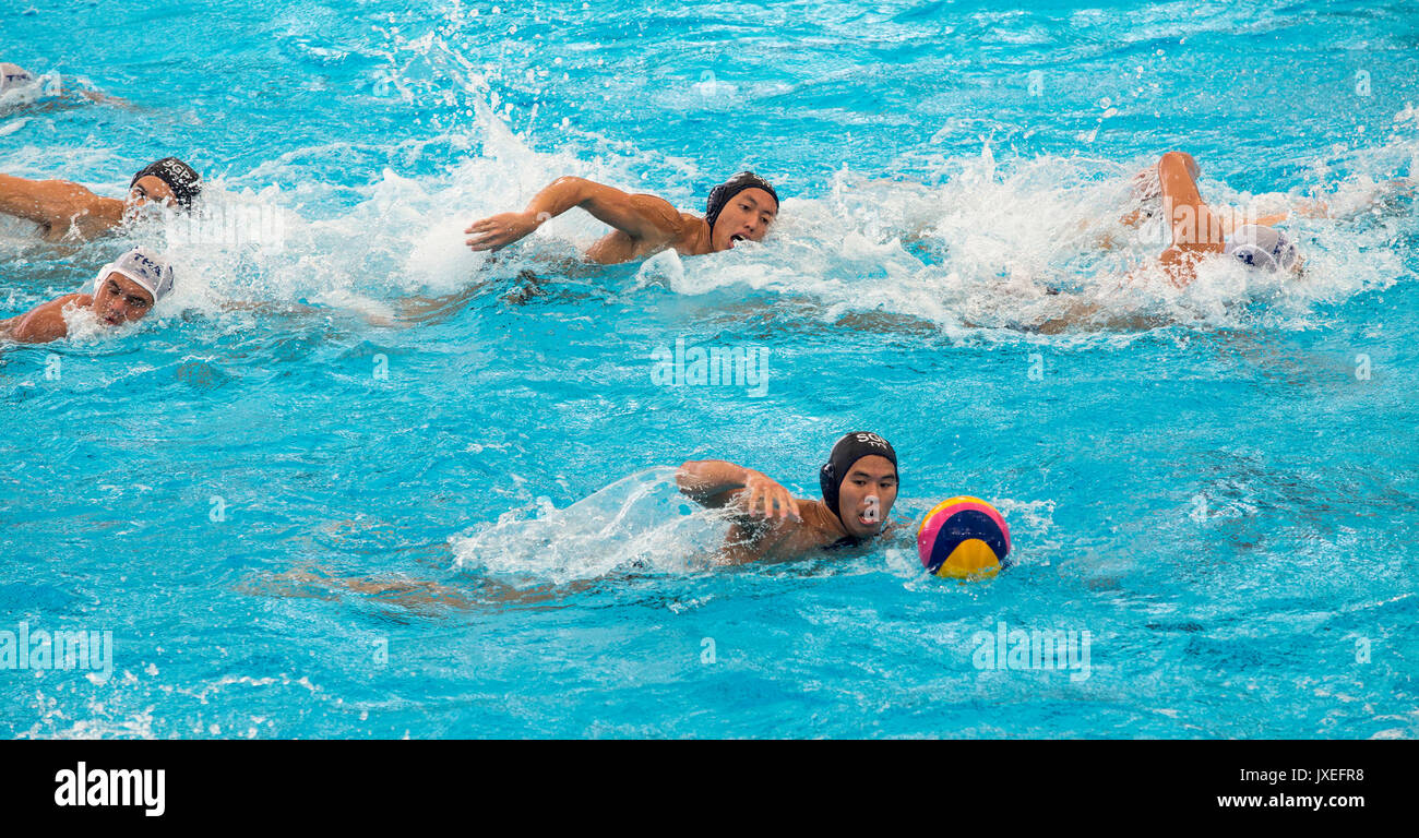 Kuala Lumpur, Malaysia. 16th Aug, 2017.  Chiam Kun Yang (number 7) of Singapore, attacks against Thailand in the men's water polo round robin match during the South East Asian Games in Kuala Lumpur. Singapore won 13-2 in their first match of the competition. Singapore dominates the competition, having won all 26 editions since the beginning of the South East Asian Peninsular Games in 1965. Credit: SOPA Images Limited/Alamy Live News Stock Photo