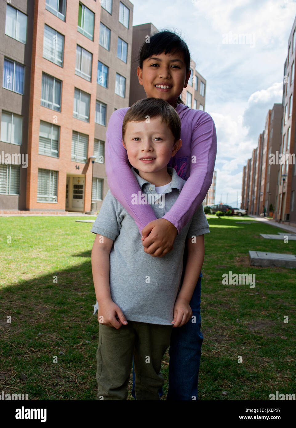 Two Young Kids happy outdoors. Stock Photo