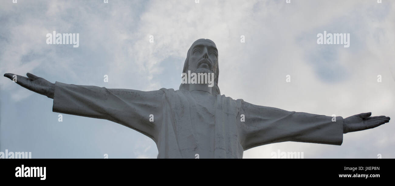 View of Cristo Rey statue of Cali against a blue sky. Colombia. Stock Photo