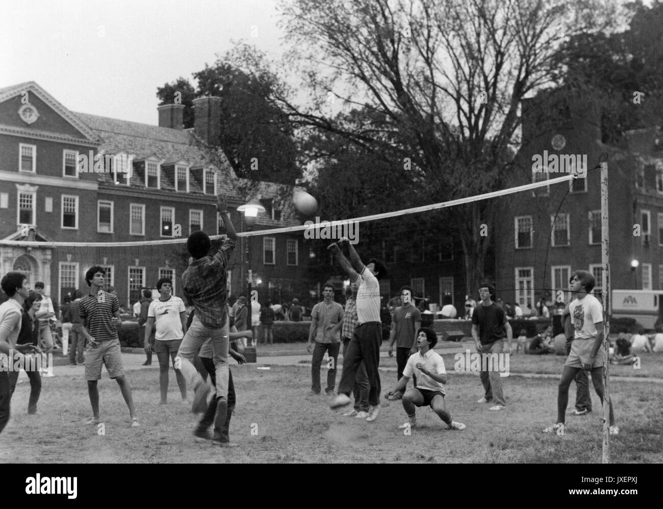 Student Life Students playing volleyball on Freshman Quad, possibly during Freshman Orientation, 1980. Stock Photo