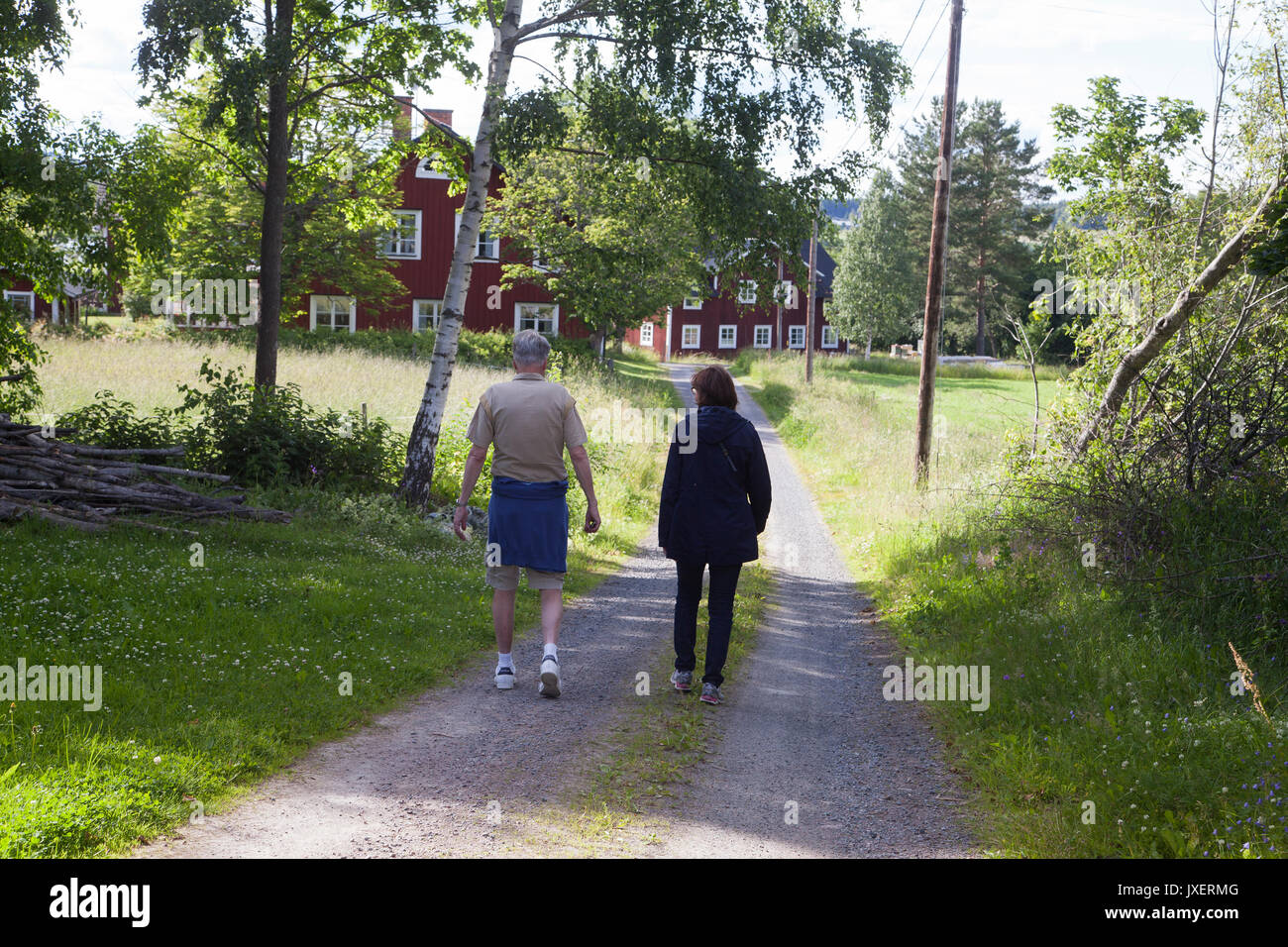 Older couple on a stroll in nature 2017 Stock Photo