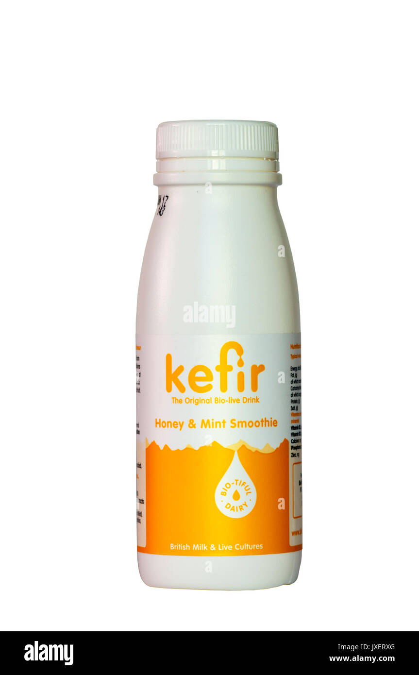 A bottle of Honey and Mint flavoured Kefir, a fermented milk drink Stock Photo