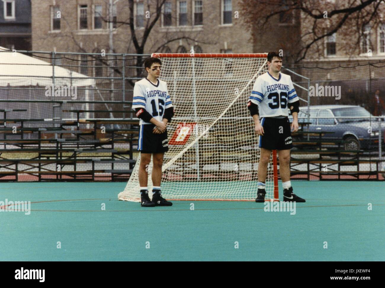 Lacrosse, Wills, Jeff, Lukacz, Brian Jeff Wills (#16) and Brian Lukacz (#36), the 1992 captains of the lacrosse team are standing in front of the goal post where a small flag memorializing Hopkins war dead was placed, 1992. Stock Photo