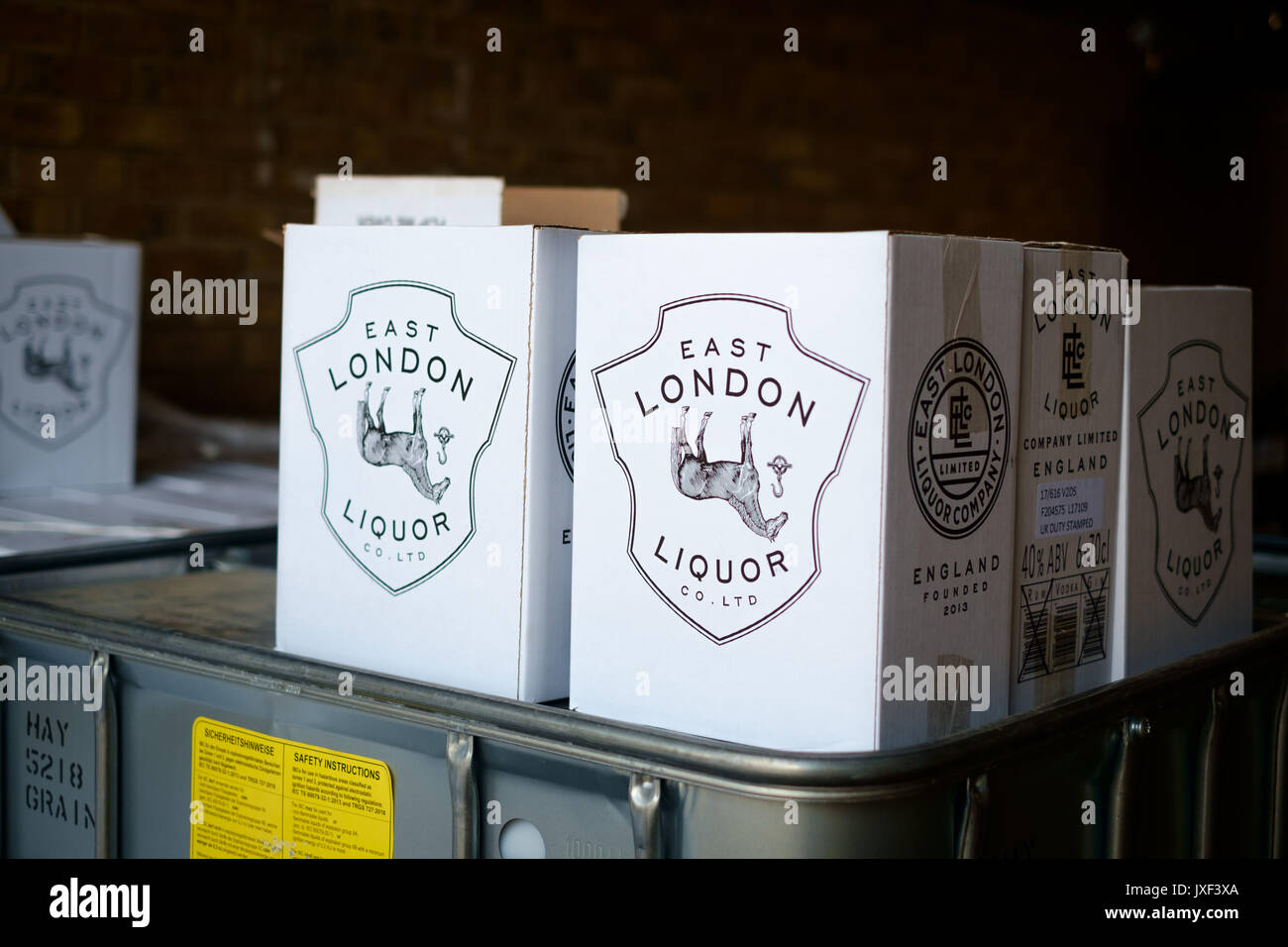 Cases of craft Gin awaiting collection at The East London Liquor Company near Hackney, London, UK Stock Photo