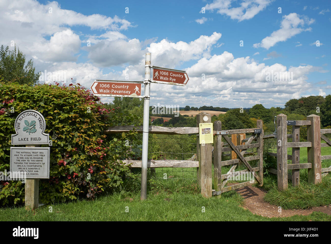 1066 Country Walk, finger post footpath signs pointing from Battle to Pevensey and from Battle to Rye, East Sussex countryside, UK, GB Stock Photo