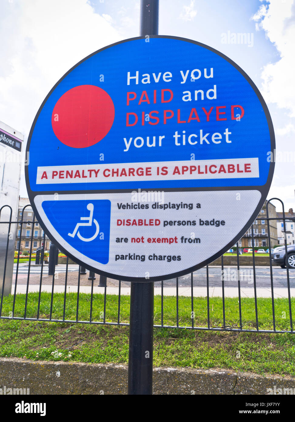 dh Pay and Display PARKING UK Pay and display sign disabled badge drives not exempt carparking Stock Photo