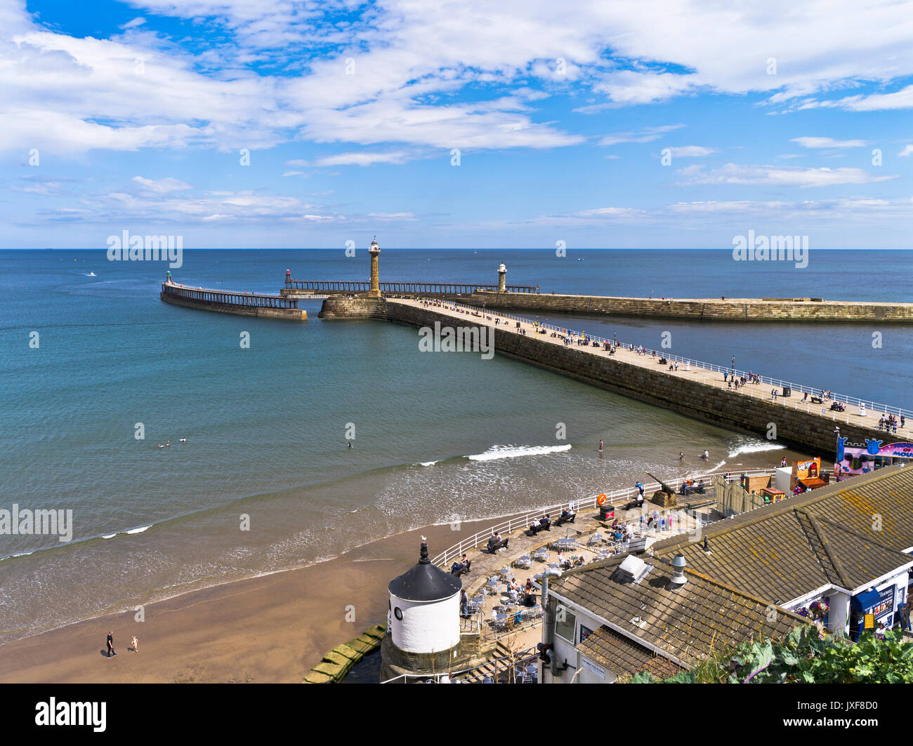 dh  WHITBY HARBOUR PIER NORTH YORKSHIRE UK Seafront seaside resort uk holiday resorts Stock Photo