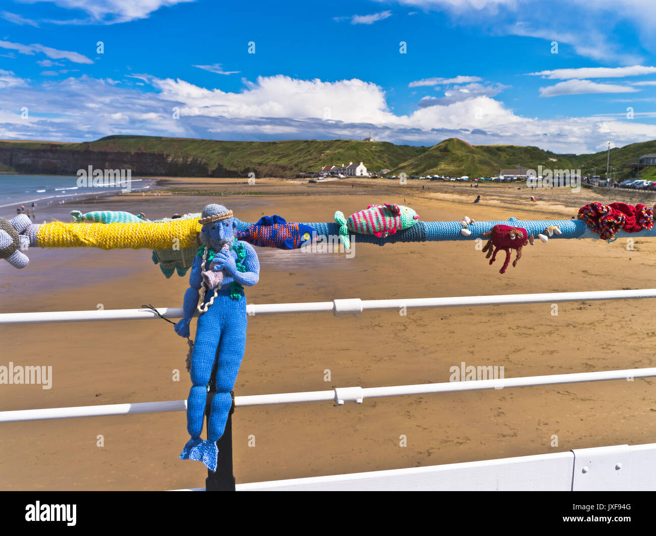 dh Guerilla knitting pier SALTBURN BY THE SEA CLEVELAND Knitted sea figures Neptune crochet yarn bombing storming knit urban art Stock Photo