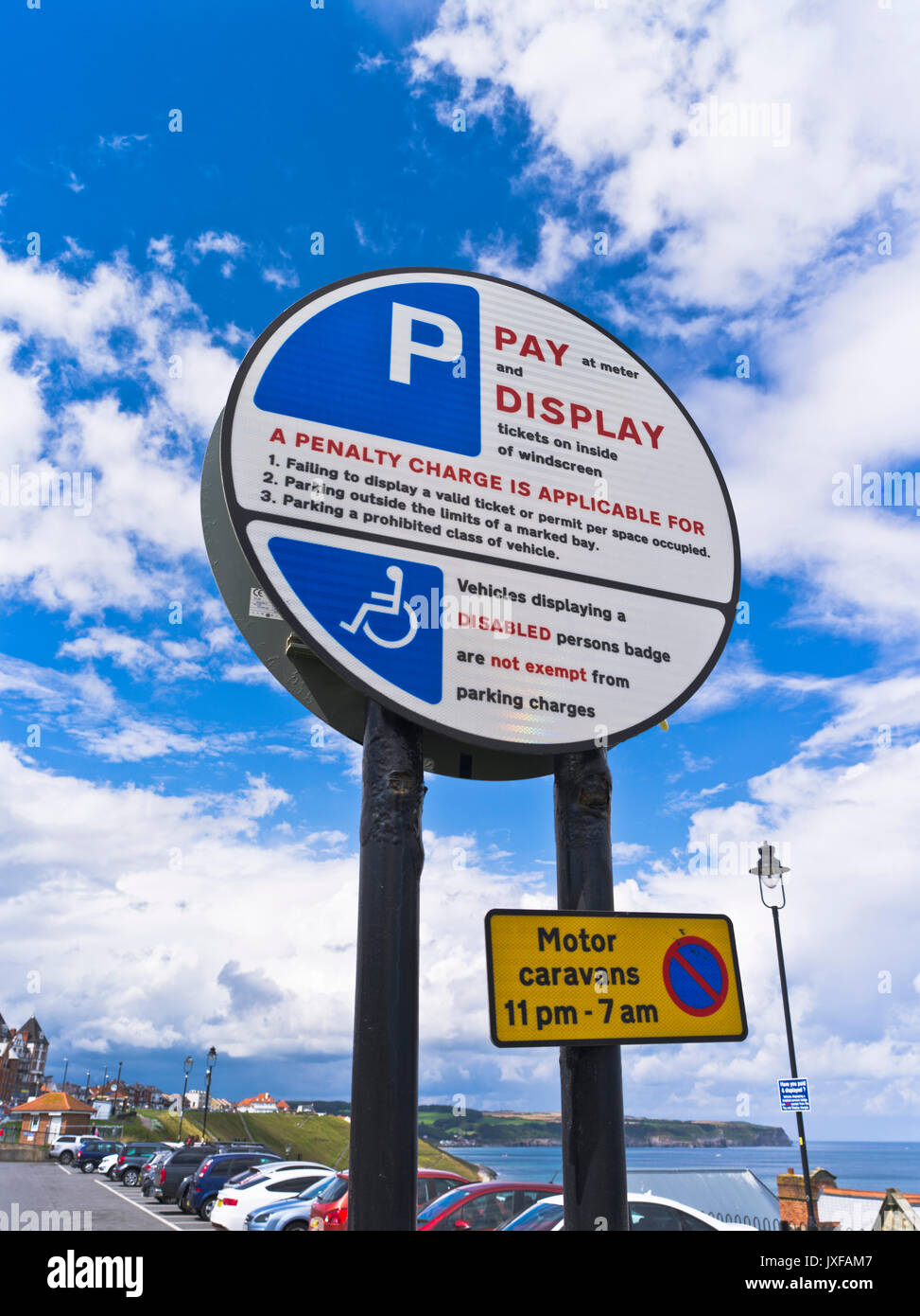 dh Pay and Display PARKING UK Pay display sign disabled badge drives not exempt parking carparking Stock Photo