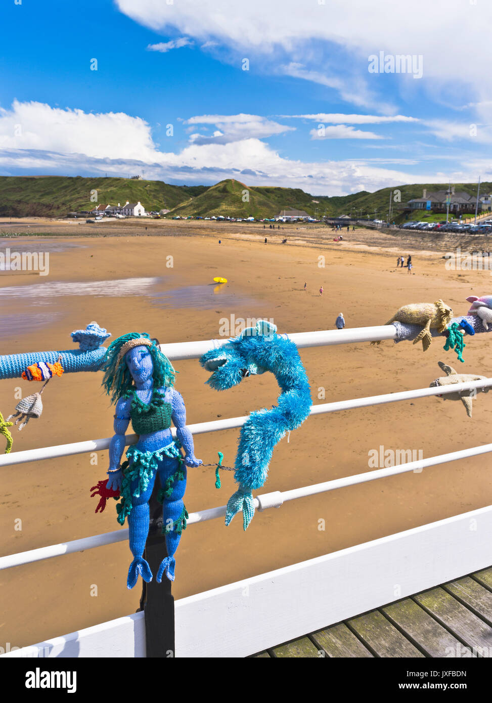 dh Guerilla knitting pier SALTBURN BY THE SEA CLEVELAND Knitted sea figures Neptune seahorse crochet yarn bombing knit storming art Stock Photo