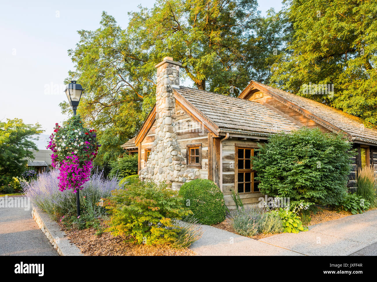 Historic Allison House, a pioneer homestead log cabin at Quails' Gate Winery, West Kelowna, Okanagan Valley, British Columbia, Canada Stock Photo