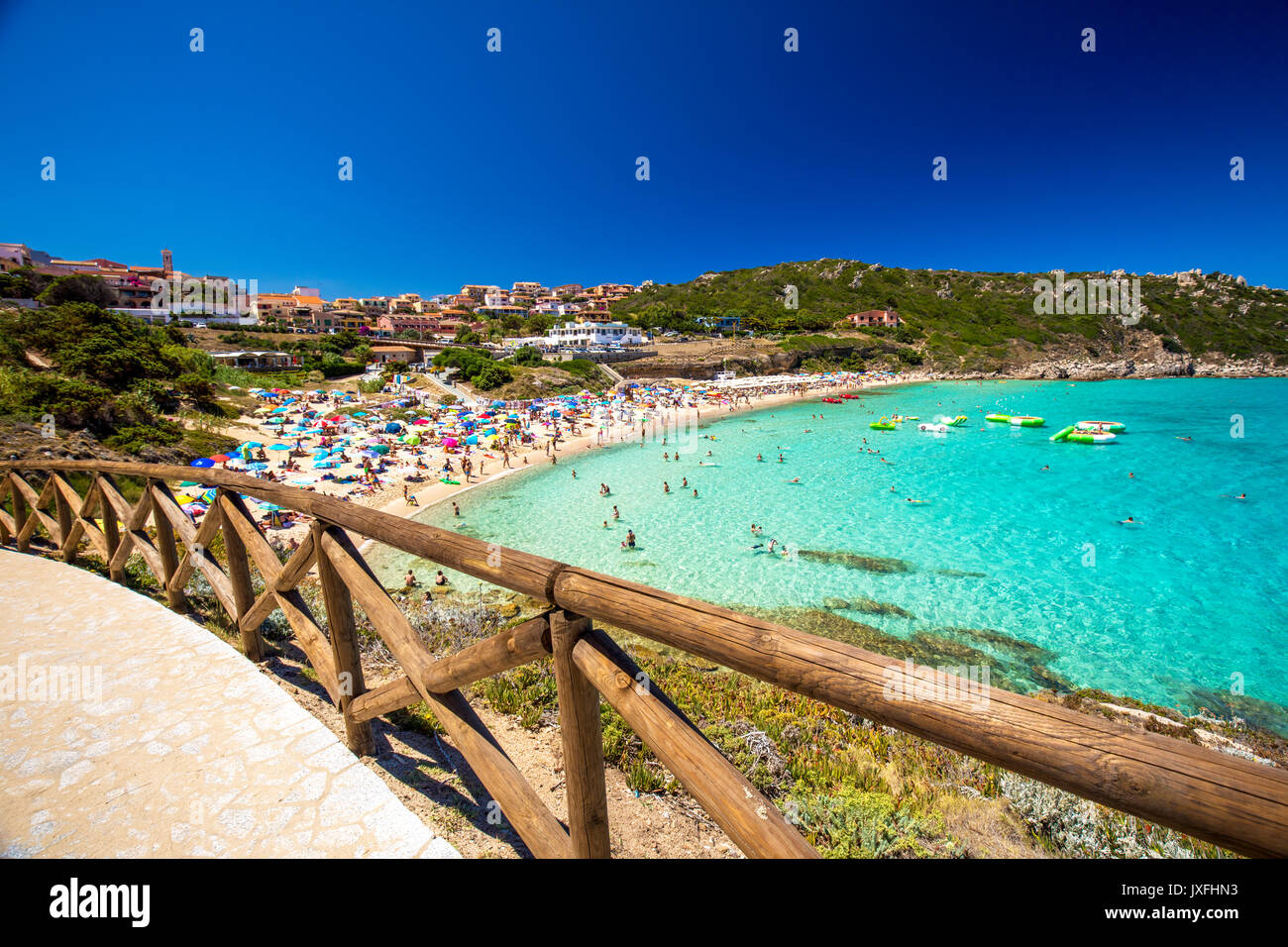 Spiaggia di Rena Bianca beach with red rocks and azure clear water, Santa Terasa Gallura, Costa Smeralda, Sardinia, Italy. Stock Photo