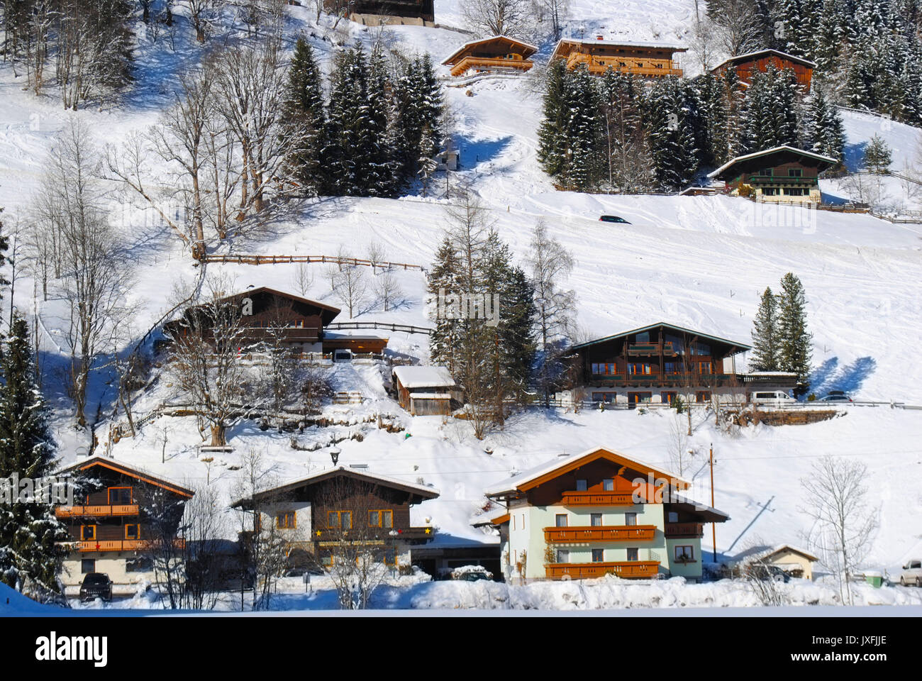Traditional Austrian houses. Many of them are rented out to skiers and tourists during the winter and summer seasons. Stock Photo
