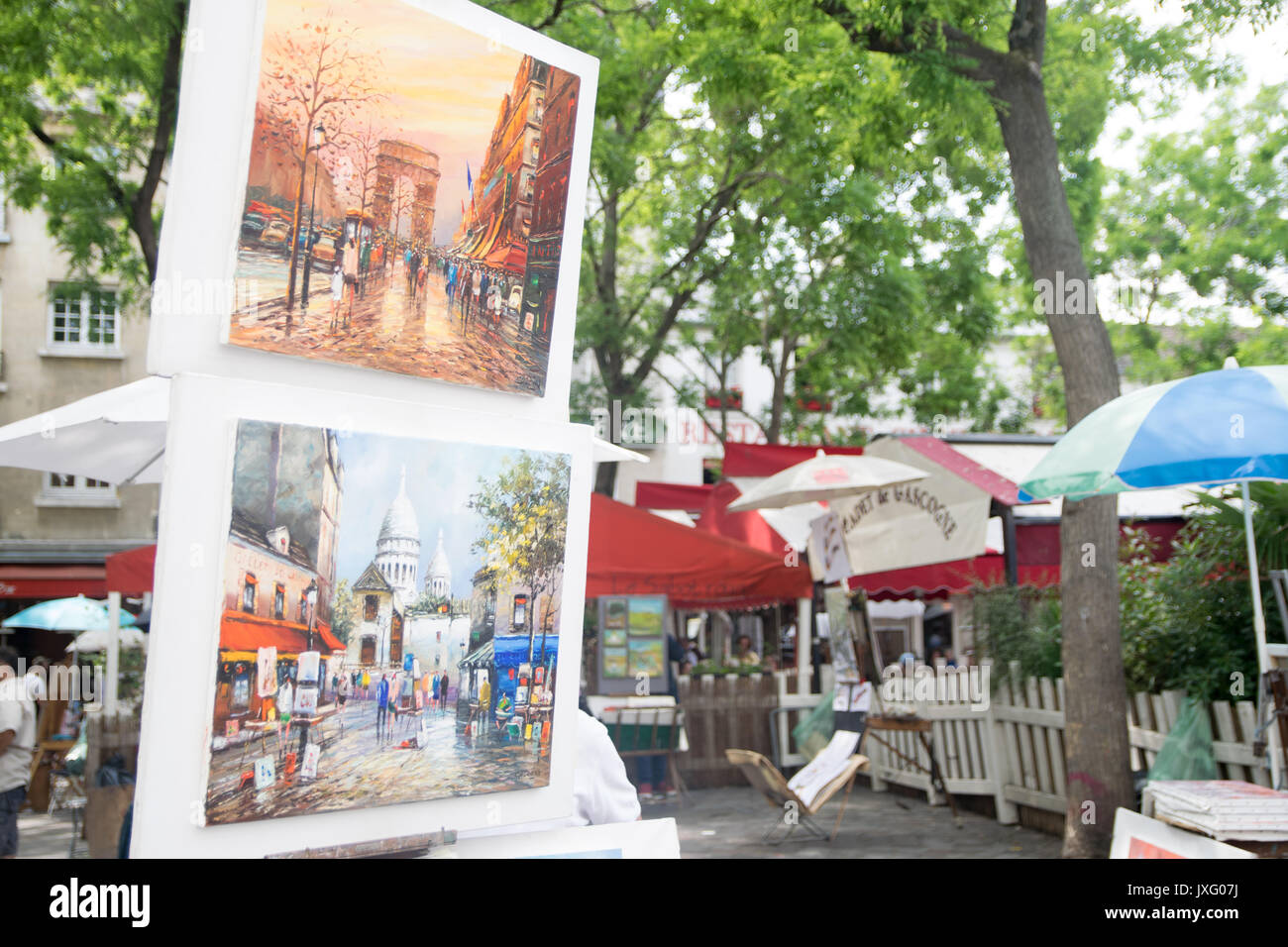 PARIS, FRANCE - JUNE 07, 2017:  Paints at artists area in Montmartre neighborhood Stock Photo