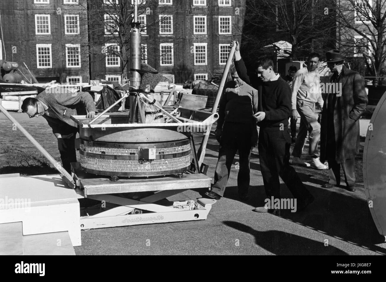 Astrophysics, Classes, Student Life Students and faculty are loading a balloon telescope, 1963. Stock Photo