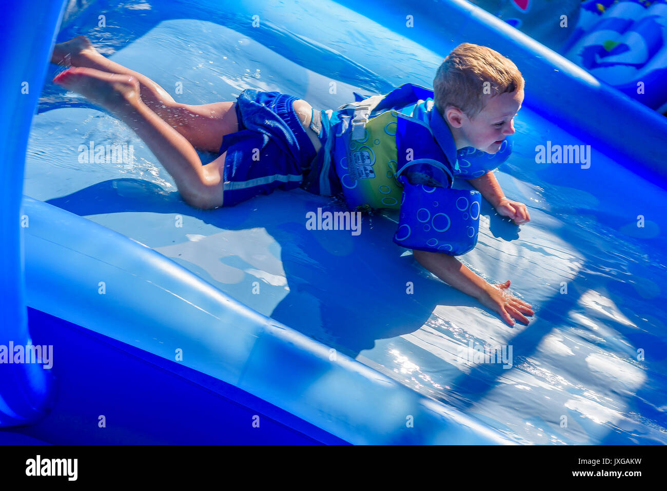 Young Boy On Backyard Water Slide Stock Photo 154023629 Alamy