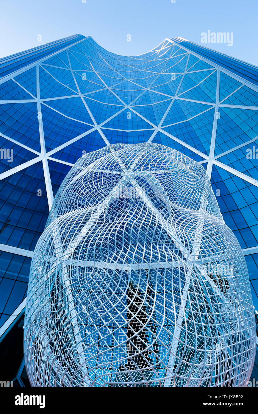 Sculpture titled "Wonderland" by Jaume Plensa. The Bow Tower, Calgary, Alberta, Canada Stock Photo