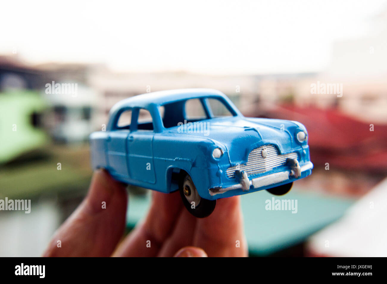 Vintage model Ford Zephyr car on location with house roofs Stock Photo