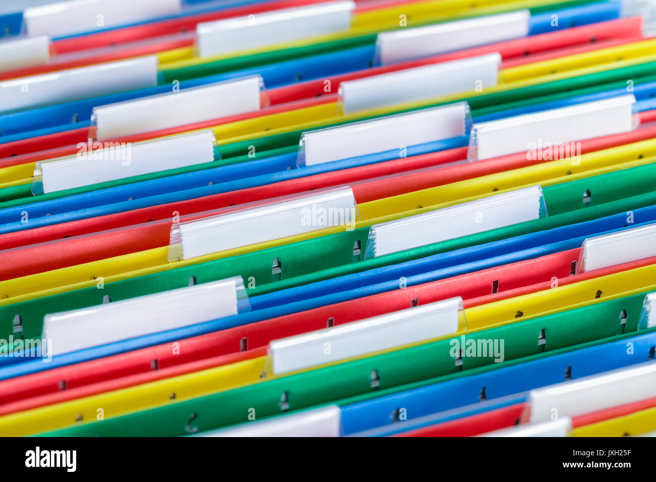 Colored File Folder with Tabs Close Up. Stock Photo