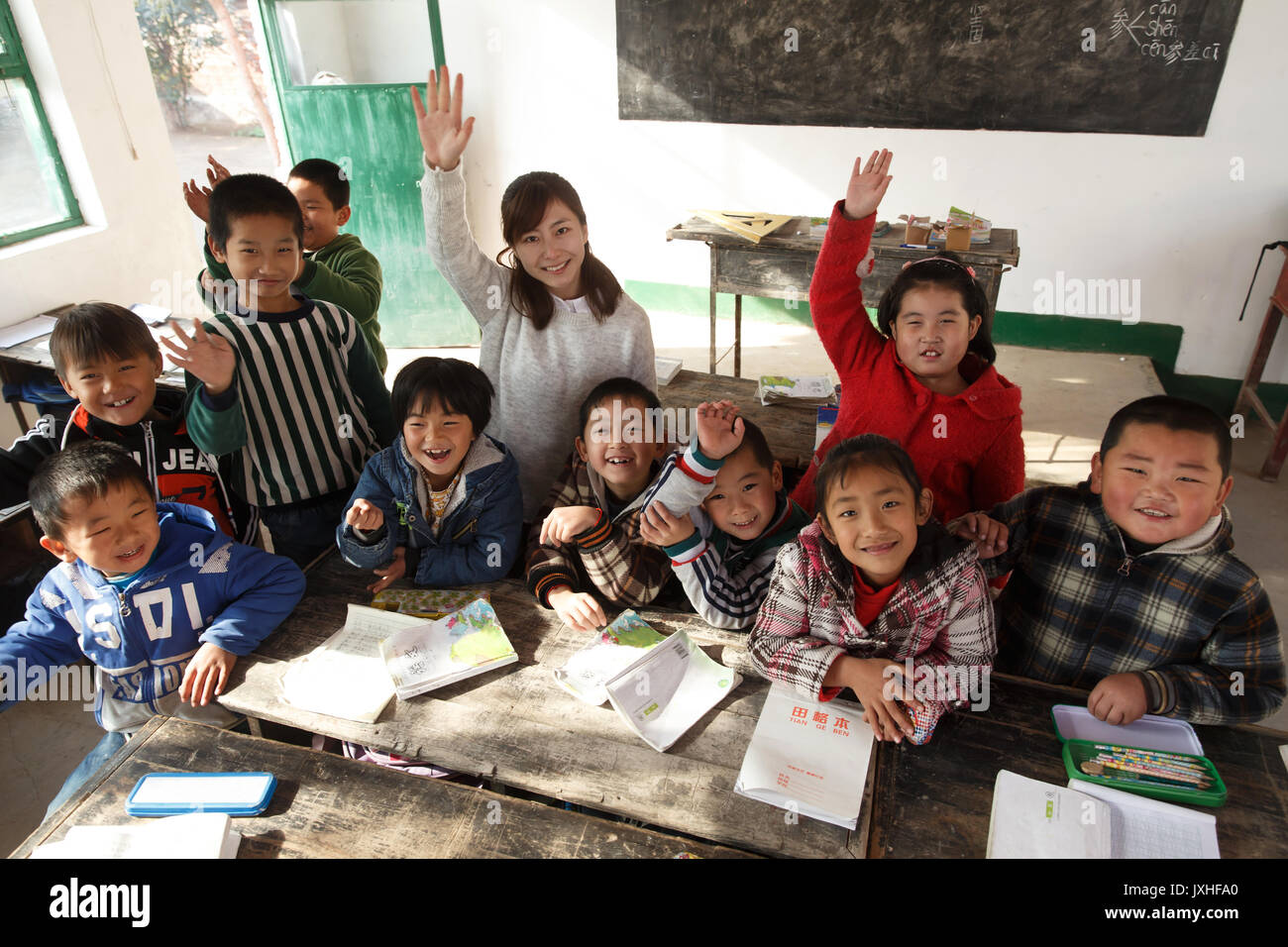 Rural female teachers and pupils in the classroom Stock Photo - Alamy