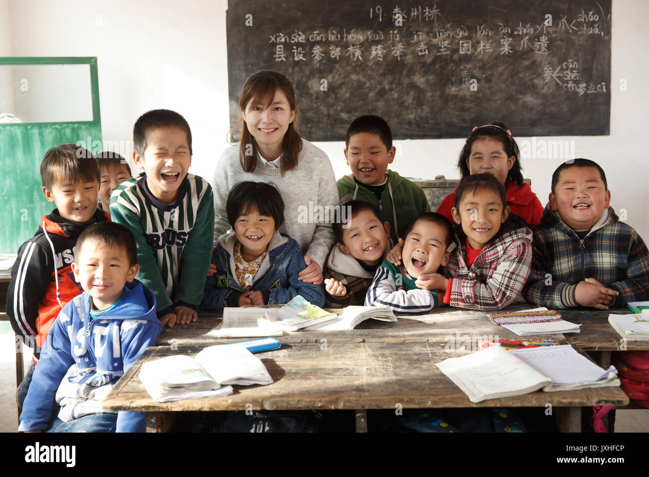 Rural female teachers and pupils in the classroom Stock Photo - Alamy