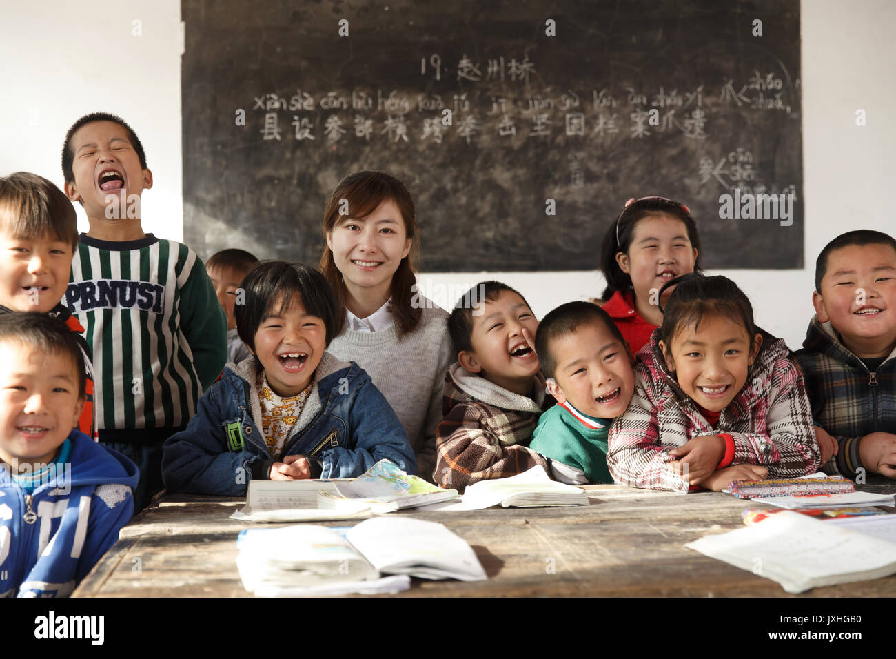 Rural female teachers and pupils in the classroom Stock Photo - Alamy