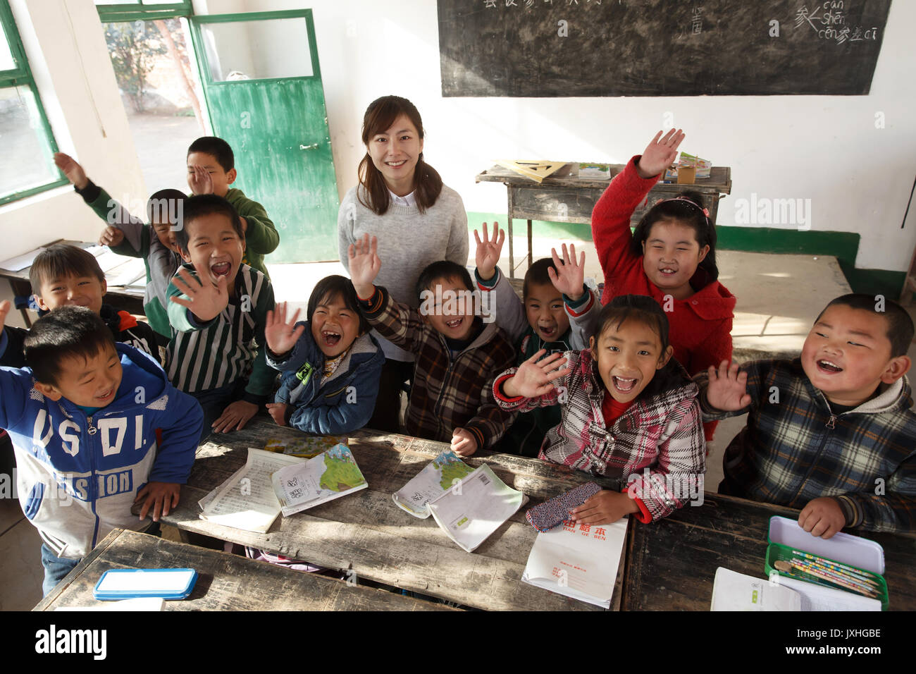 Rural female teachers and pupils in the classroom Stock Photo - Alamy