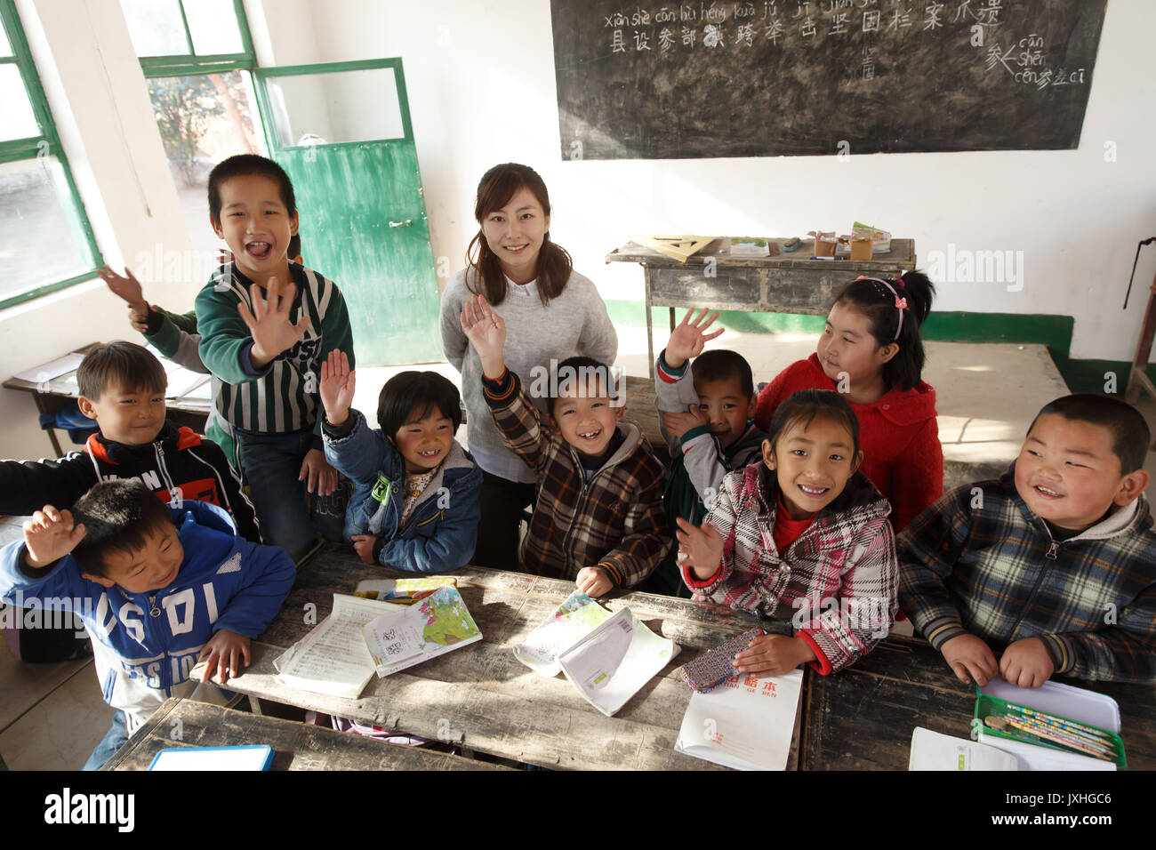 Rural female teachers and pupils in the classroom Stock Photo - Alamy