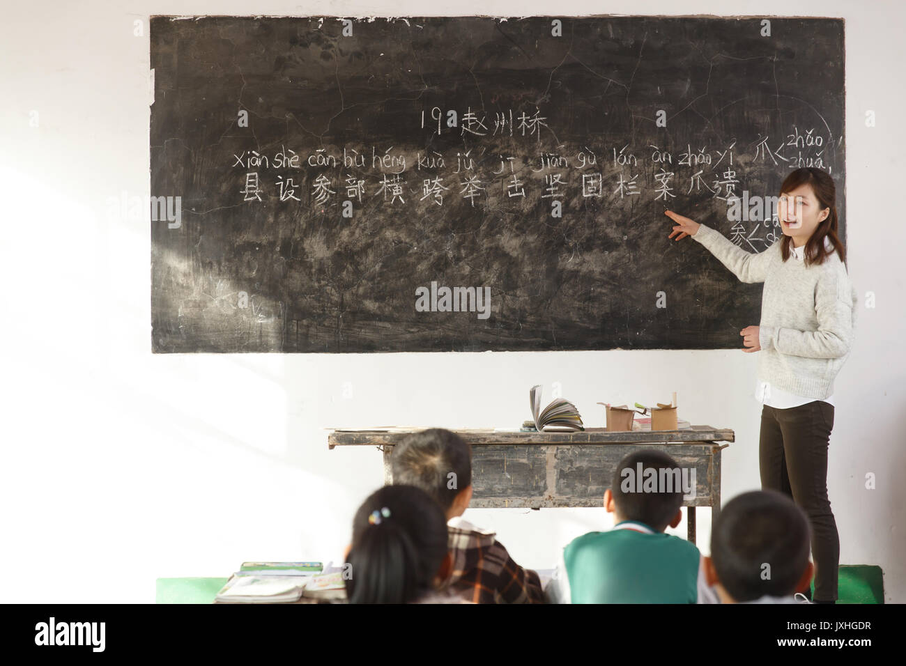 Rural female teachers and pupils in the classroom Stock Photo - Alamy