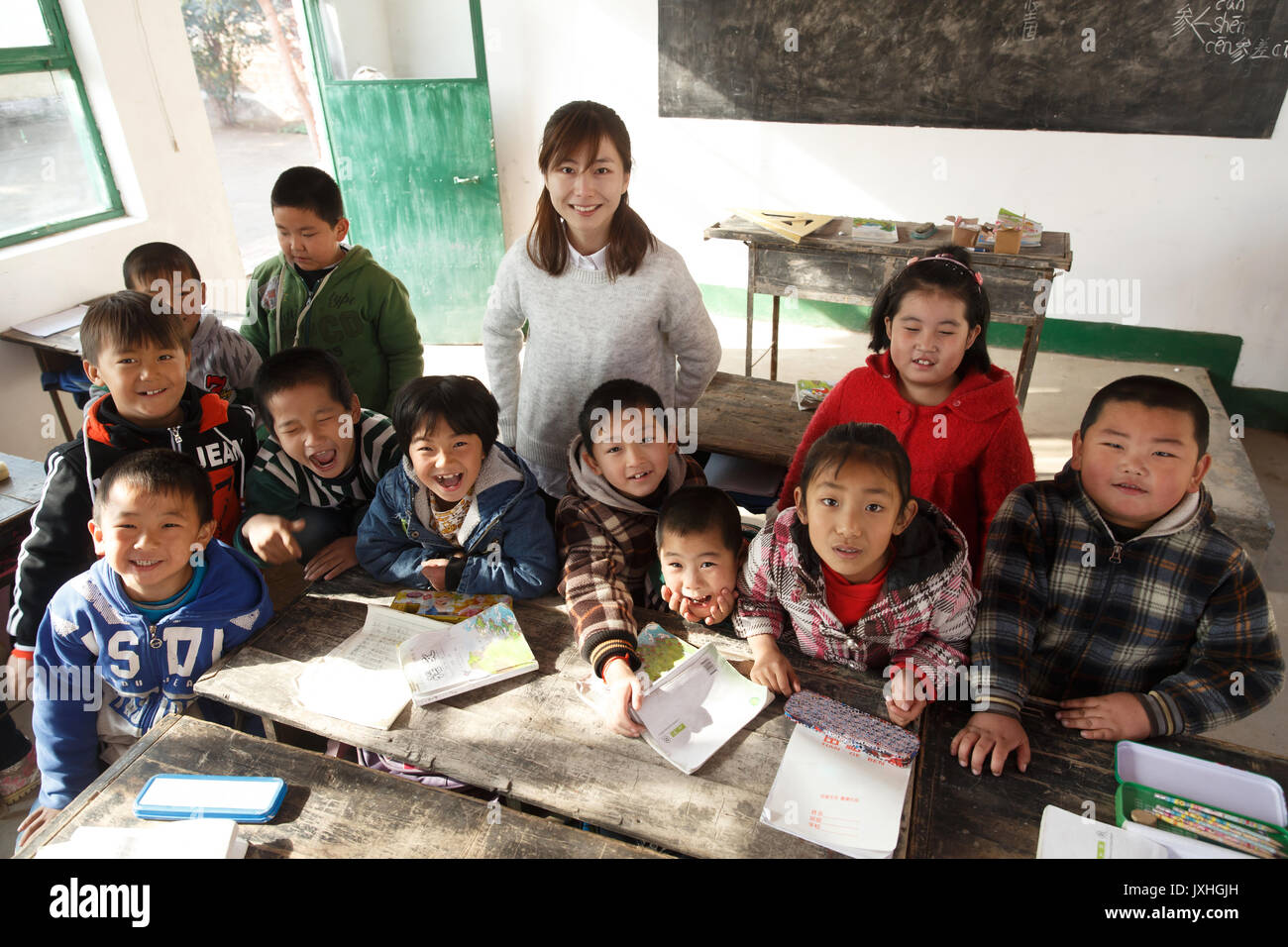 Rural female teachers and pupils in the classroom Stock Photo - Alamy