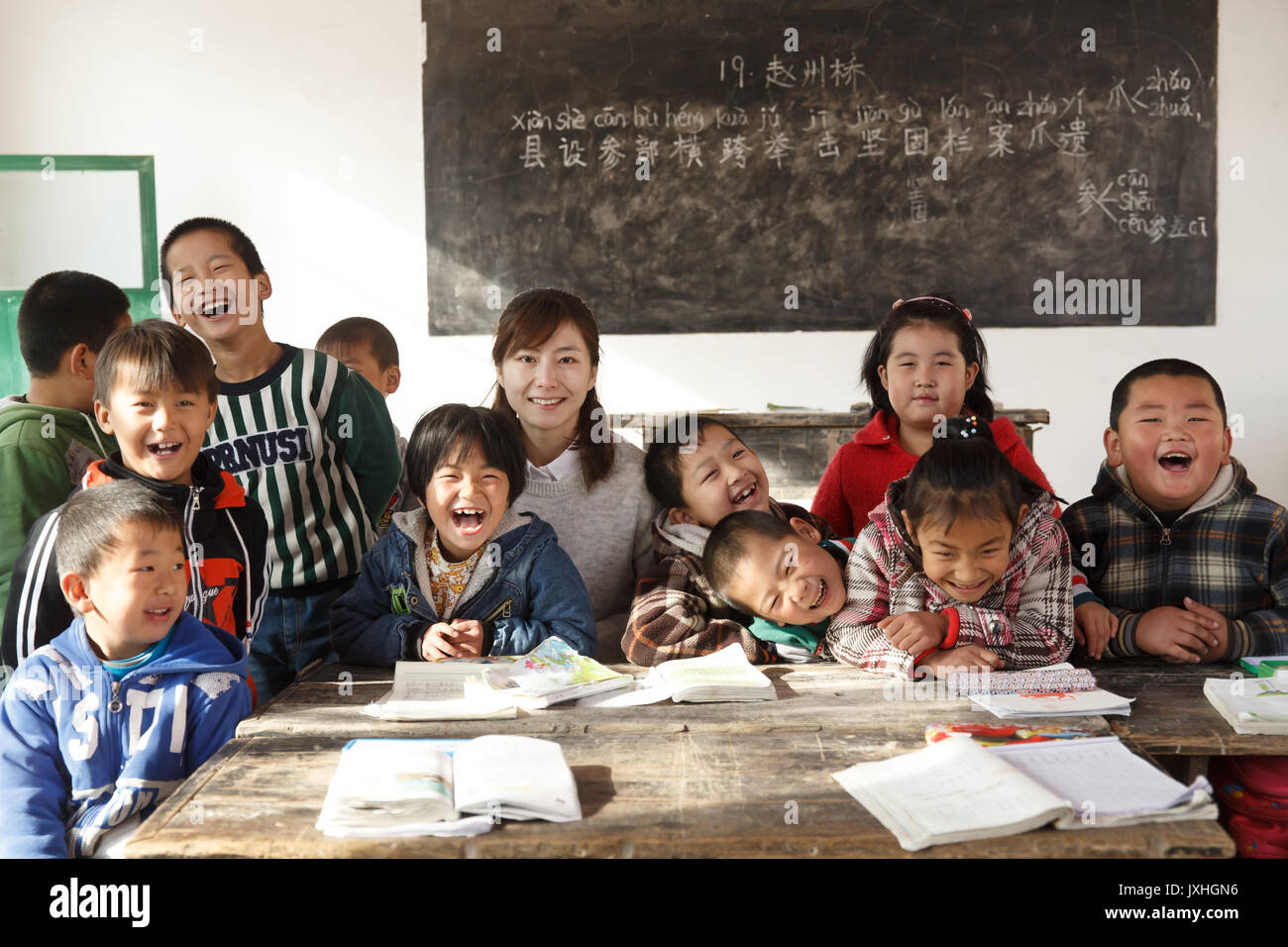 Rural female teachers and pupils in the classroom Stock Photo - Alamy