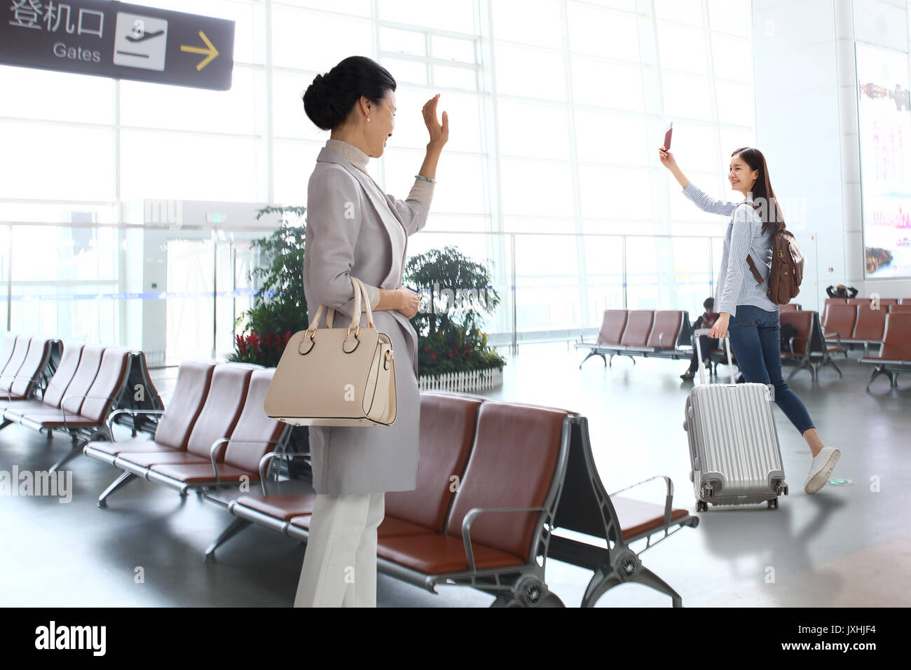 Mother And Daughter Goodbye Stock Photo - Alamy