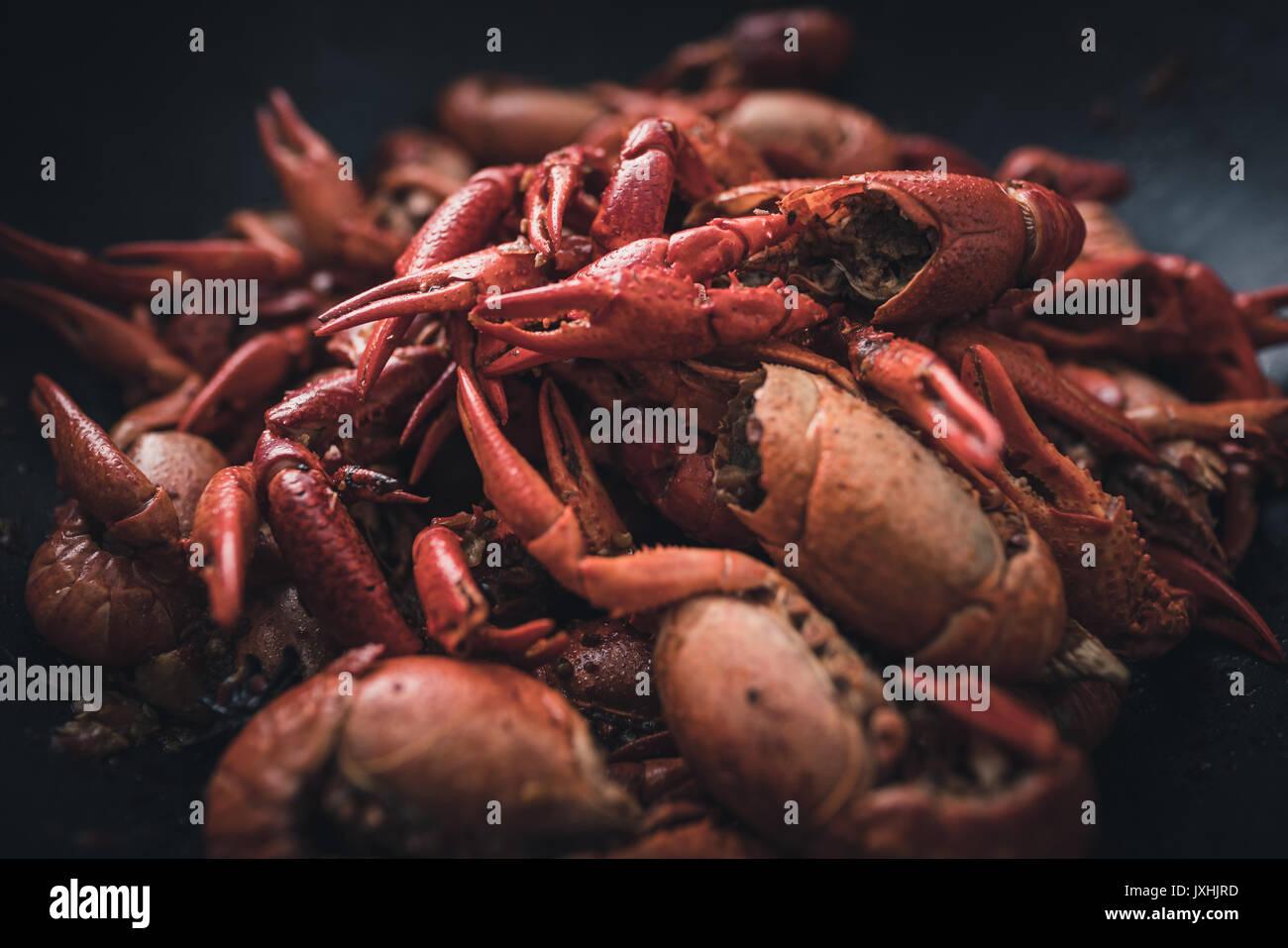 Close-up of a pile of cooked crayfish in a frypan Stock Photo
