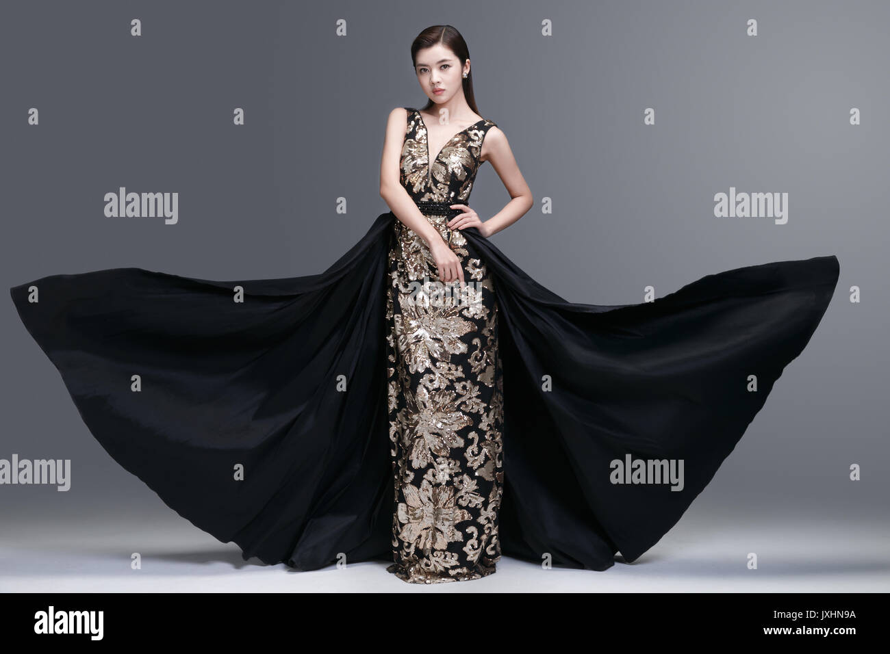Elegant woman in evening dress Stock Photo - Alamy
