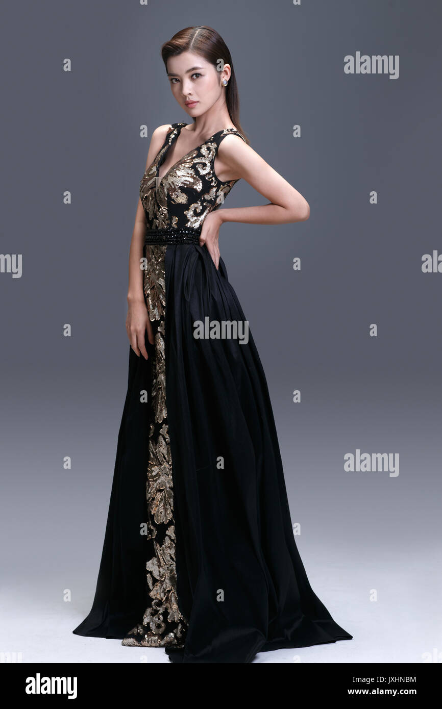 Elegant woman in evening dress Stock Photo - Alamy