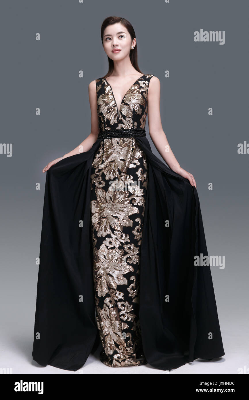 Elegant woman in evening dress Stock Photo - Alamy