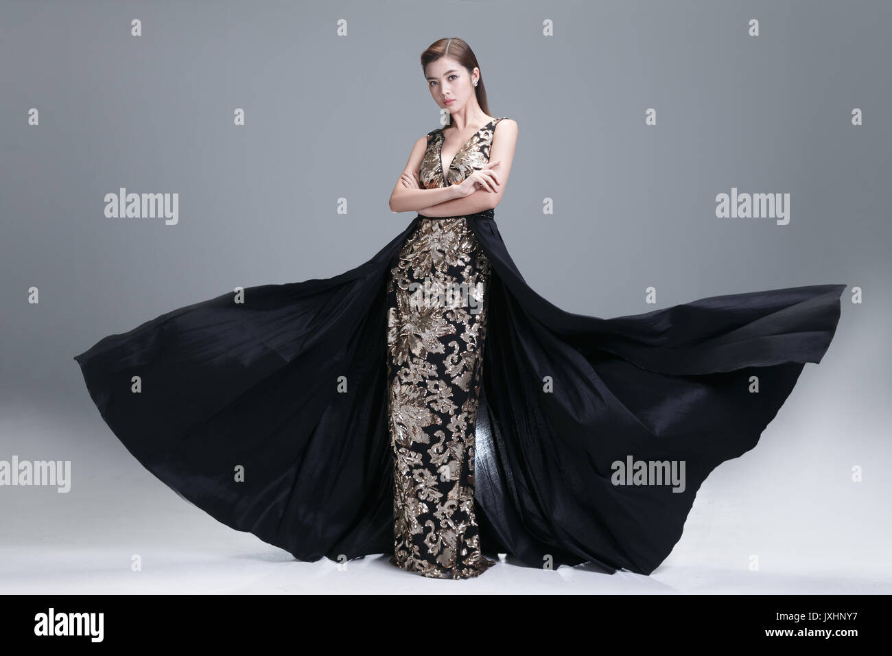 Elegant woman in evening dress Stock Photo