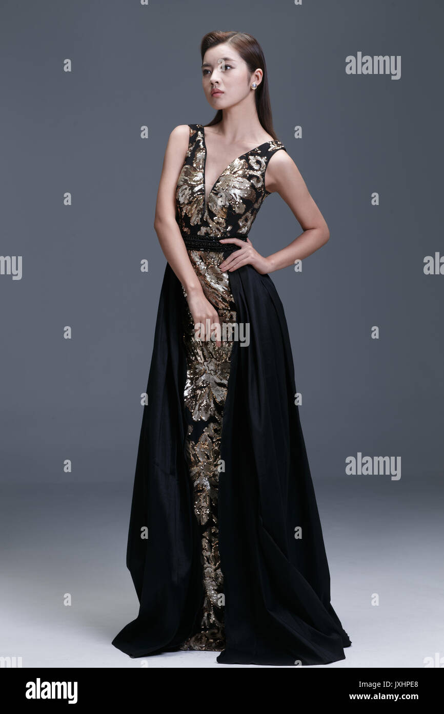 Elegant woman in evening dress Stock Photo - Alamy