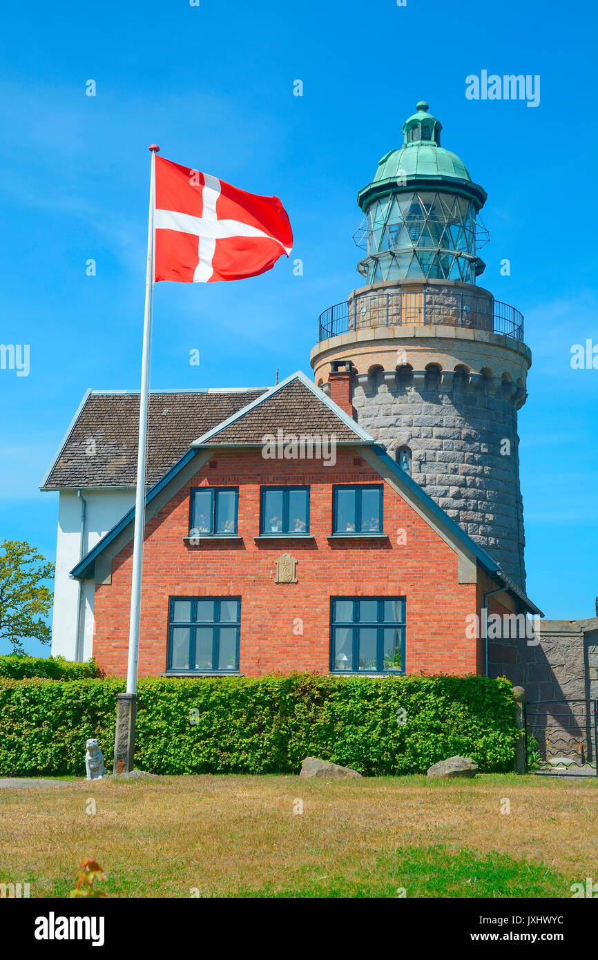 Hammeren lighthouse with Danish flag, Bornholm, Denmark Stock Photo