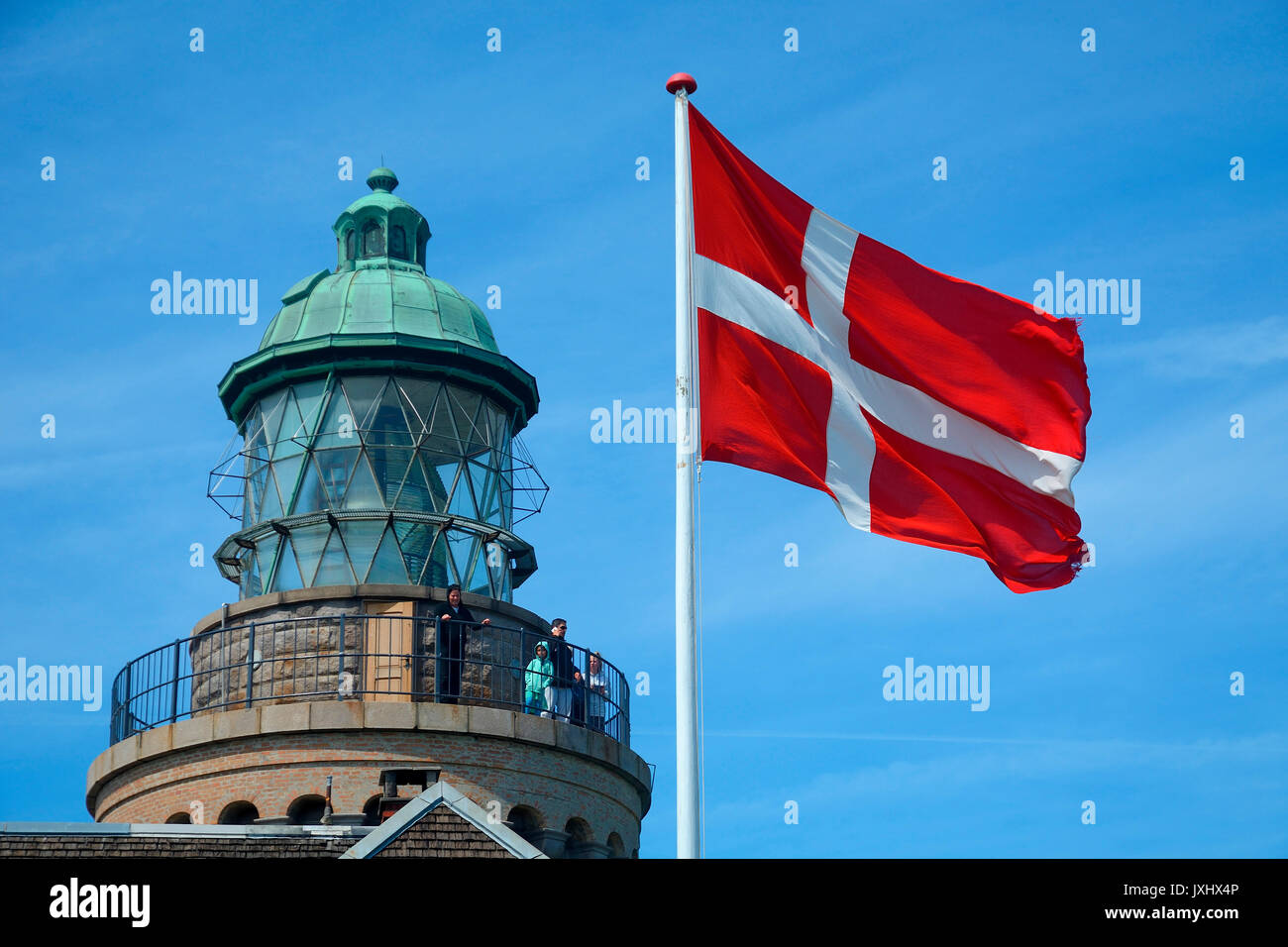 Hammeren lighthouse with Danish flag, Bornholm, Denmark Stock Photo