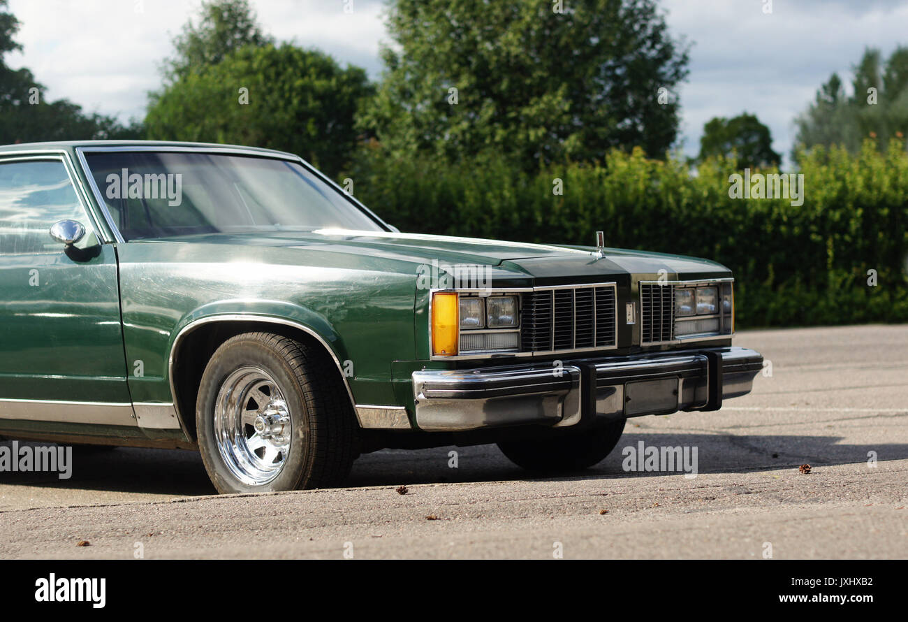 American vintage car on a city street Stock Photo - Alamy