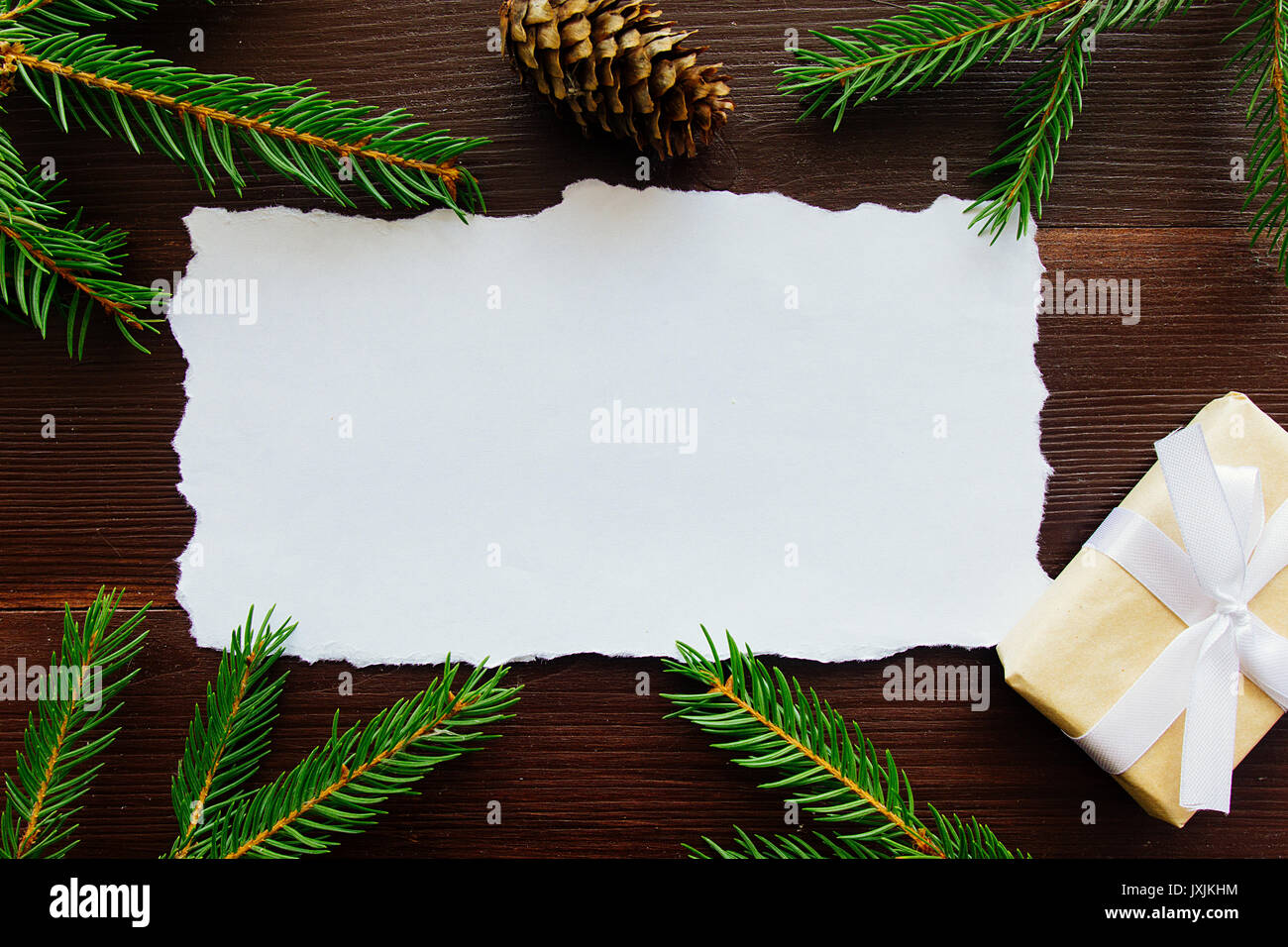 Fir branches, cones and Christmas gift copy space Stock Photo