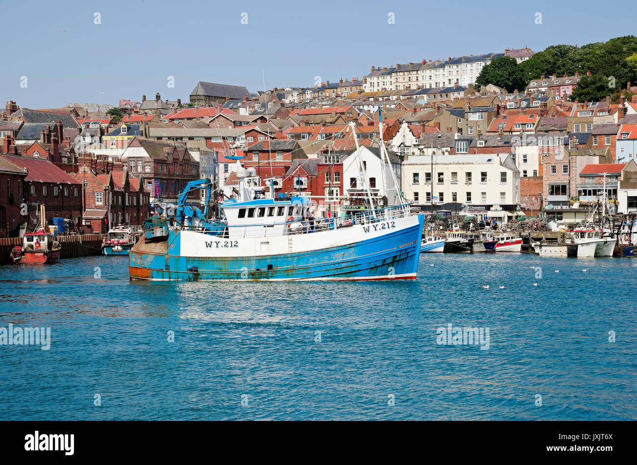 Fishing boat trawler vessel in the harbour in summer Scarborough North Yorkshire England UK United Kingdom GB Great Britain Stock Photo