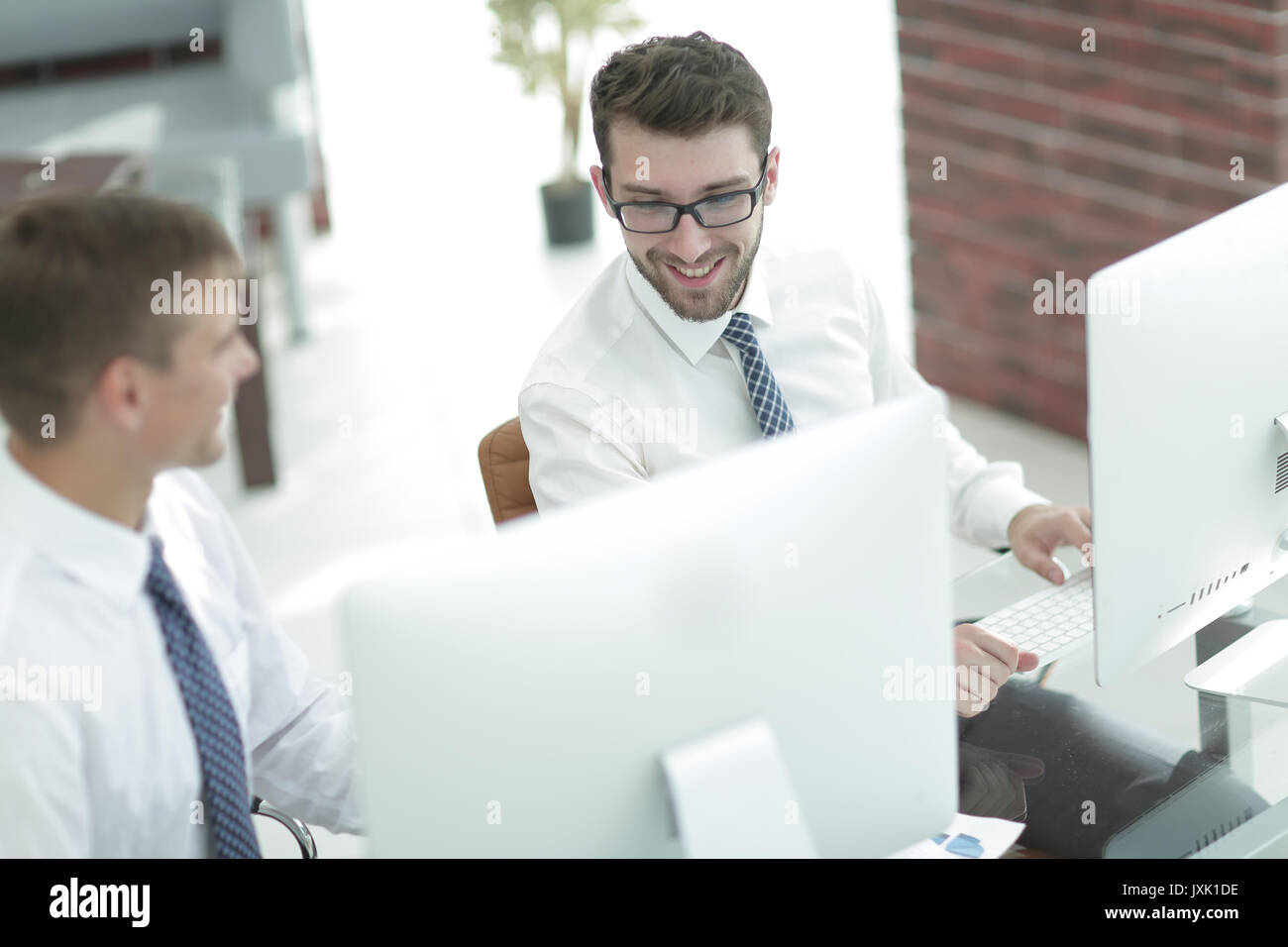 office employees work on the computer Stock Photo - Alamy