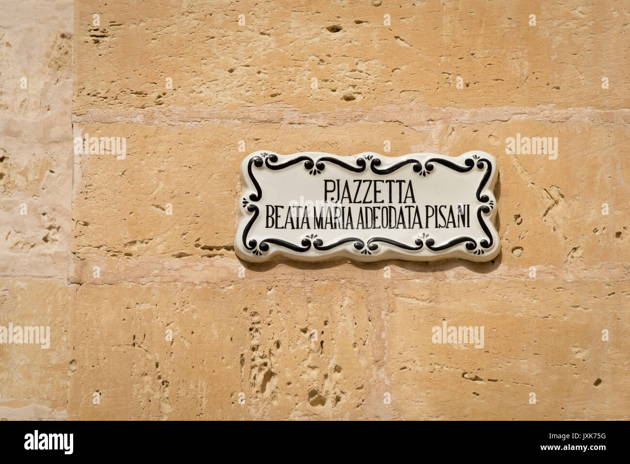 A ceramic street sign on a wall in the old town of Mdina Malta  for Pjazzetta Beata Maria Adedata Pisani Stock Photo